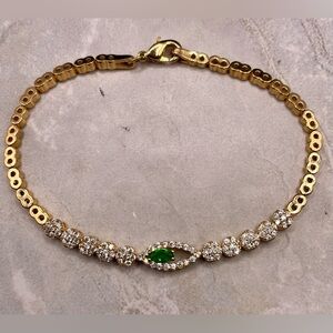 Marquis Green and Crystal Gold Tone Bracelet. 7 inches long